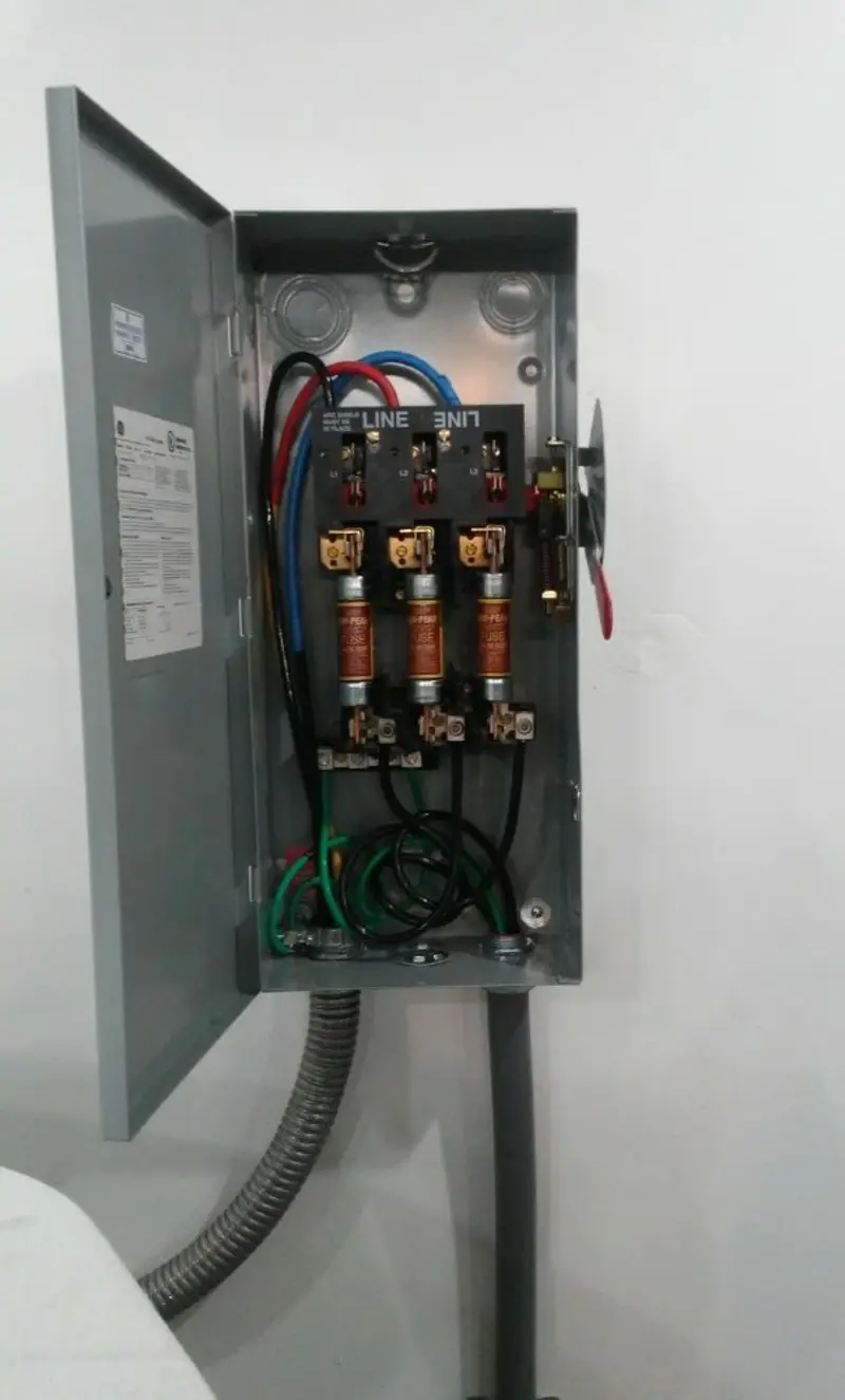 Three-phase disconnect switch installed for Smoke Detector Installation in Converse
