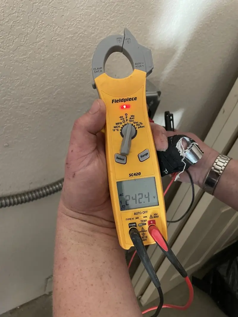 Voltage testing with clamp meter during Aluminum Wiring Replacement in Converse